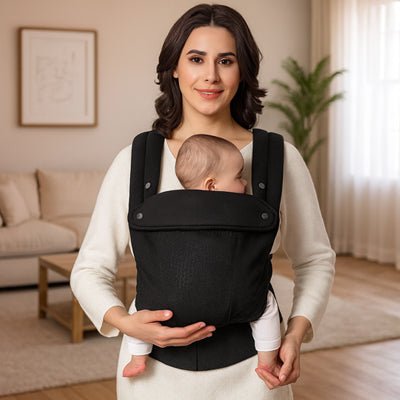 famille et porte bébé nouveau né portance™