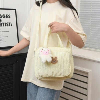 maman et sac a langer petit Douxie™ jaune