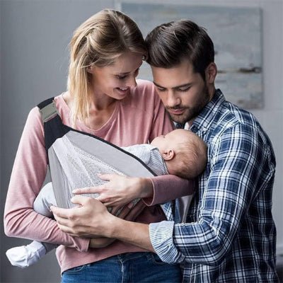 parents et écharpe de portage bébé Luméa™