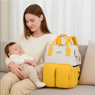 sac à langer à dos luxebébé™ jaune