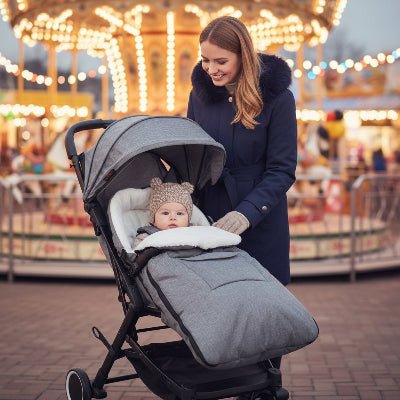 bebe dans chanceliere hiver pour poussette Frozidou™