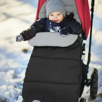 bebe dans chanceliere poussette Mousseli™ gris