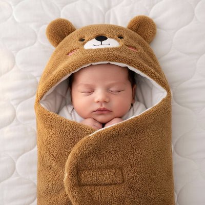 bebe endormi dans nid d ange ourson coconours™ marron