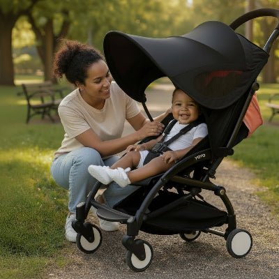 famille souriant avec ombrelle poussette Sunéo™