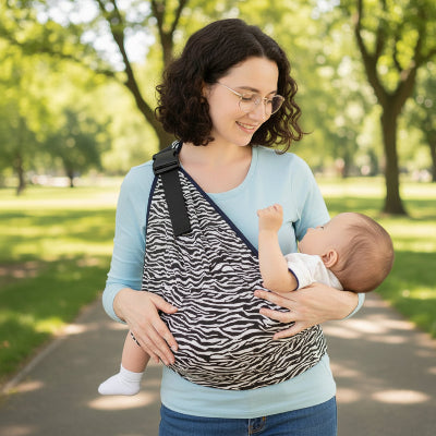 maman avec porte bebe cote hanche Hancha™ Zébré