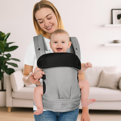 maman souriant et porte bébé nouveau né portance™