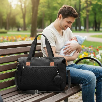 papa avec sac a langer bebe noir