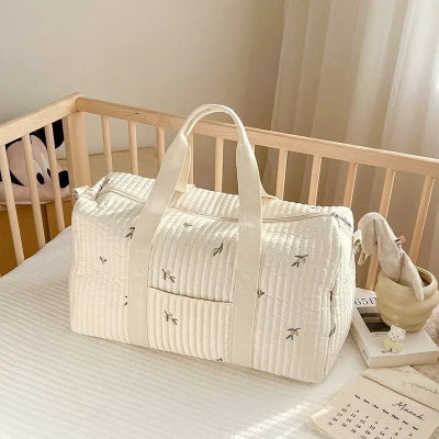 sac à langer bébé sur berceau